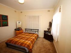 31 Fowles St Barmera SA 5345 Here's a Smart Buy to Invest or Nest! Here is the perfect opportunity for a young couple just starting out or maybe the mature couple ready to retire, or even the single person starting over. This property may seem small and compact but will be perfect for the budget buyer looking for a pre-loved home that will be easy to maintain and is value affordable buying. The large front windows allow natural warmth of sunlight to filter through and security screens are to the windows to add peace of mind. The second bedroom room has a ceiling fan, carpet and louvre windows that has the flow through sunroom or utilise as a study. The kitchen has an electric stove, floor and overhead cupboards, hexagon island bench for extra bench space, and nearby is the open plan diner and lounge. The lounge room with easy care vinyl flooring, slimline venetians and reverse cycle split system provides for added comfort on those lazy stay at home nights, and staying up late with the T V still on wont be a problem with your two kilowatt solar system to decrease the power bills. Bathroom incorporate shower, vanity unit and the mosaic tiled floor laundry has a stainless steel tub. On the back of the home is a full length paved veranda, perfect for undercover entertainment and a good sized lockable shed will be perfect to tinker in for a workshop or use as storage. The large, easy care allotment has rear lane access through double gates and has decorative ornamental splashes of colour with a lushest green lawn. This home is priced well and has a multitude of new beginnings; - it's now ready to sell!