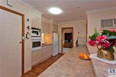4 Gordon St Wodonga VIC 3690 $349,000 SOLID CENTRAL CHARMER 3 2 5 Only 500m from the Water Tower in the centre of Wodonga you will be surprised to find this charming 3 bedroom home with 2 bathrooms. 4 Gordon Street is a very practical home in every sense, from the modern kitchen to the powered workshop, it offers a lovely sanctuary for all who enter. Vinyl floating floors, warm wood tones throughout and a lovely, low maintenance garden come together to make this one very attractive home. The master bedroom, at the rear of the home, has a delightful ensuite & walk in robe. Both of the other bedrooms are generous in proportion & each offers built in robes. Having a large lounge with separate dining area & an additional living area adjacent to the kitchen means that you have options on how to use each room – depending on whether you have children that you need to escape from. The decor of the modern kitchen is light & neutral in tone and is complemented beautifully by the deep warmth of the wood-look flooring. A double glass sliding door from the family room opens out to a paved verandah that is a fantastic sun catcher on those crisp winter days. For the handy man or woman, the original garage at the rear of the property makes an ideal workshop with power & a roller door. For outdoor entertainment you have both covered and open areas complimented by a cute fish pond and gorgeous garden, all easily accessed by steps or a ramp. Too many cars? This property may suit your needs with a double enclosed carport at the front, room for 2 cars undercover directly behind this and the garage/workshop if required. With sports facilities just down the road an afternoon watching a match, keeping fit or walking the dog is definitely on the cards. Don’t miss the opportunity of owning this solid home in a great location. Additional information Property Type House Property ID 11042100297 Street Address 4 Gordon Street Suburb Wodonga Postcode 3690 Price $349,000