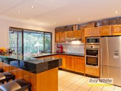 12 Fitzgerald Ct Clear Mountain QLD 4500 $699,000+ Price Reduction! the Ultimate Gift - Privacy, Atmosphere, Comfort and Lifestyle This unique 1.5 plus acre property is bounded on 2 sides by acres of parkland and Branch Creek creating a setting of both extreme privacy and country lifestyle. This nature's gift property allows you to experience an abundance of wildlife and birdlife (including Koalas) while enjoying splashing or swimming in the rock pools of the creek. The large 2 storey home is both functional and practical and features 4 built in bedrooms (main with ensuite and walk-in-robe) formal and informal living downstairs as well as a children's family room upstairs, a spacious modern Tassie oak kitchen with modern electric appliances and loads of bench space and separate study. There is a very large outdoor entertaining area off the family room as well as front veranda and small deck off the main bedroom. The home also includes split system air-conditioning, a 3.5kw solar power unit, it is wired for a generator, has a wood burning fireplace and has multiple data connection points throughout the home. The property is all useable and is ideal for your own hobby farm. There is also a large separate shed for 2 additional cars plus workshop (with 3 phase power available) and a free standing office for anyone wanting to work from home or just use as their hobby room. This unique style of living is located just 10 minutes to either Samford Village or Eatons Hill shopping and schools and 40 minutes to the C.B.D. So, if you're seriously looking for a change of lifestyle for you and your family, this property is truly a nature's gift!