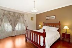 26 Mallam Rd Picton NSW 2571 $715,000 Botanic Gardens wonderland! - 976m2 Situated high up in the ever popular Botanic Gardens Estate this spacious pristine family property is a family entertainment sensation! Internal features include generous formal lounge, sunny open plan kitchen and dining flowing through to the over sized rumpus and outdoor entertaining. Caesar stone kitchen bench tops. Nine foot ceilings throughout. All of the bedrooms are large, and the master bedroom has an ensuite, walk in robe and a lovely bay window. The main bathroom boasts a large corner spa bath and vanity. Separate toilet. LPG gas heating, down lights, alarm system and 3 zoned ducted air conditioning. Outdoors is an entertainers paradise with the massive covered entertaining area overlooking the superbly landscaped in-ground solar heated pebble crete salt water pool and lovely 180 degree views to the Picton Hills. Level and fully usable yard. Double garage with remote. Enjoy all this wonderful home has to offer in a prime position. Whether you want to take a stroll along the bike track, walk amongst the gardens, play a round of golf or head to the local shops the location is perfect. Other features: Built-In Wardrobes,Close to Schools,Close to Shops,Close to Transport,Garden Elders Property ID: 8582774 4 bedrooms 2 bathrooms 2 car parks Land Area 976 square metres Double garage Swimming Pool Air Conditioning