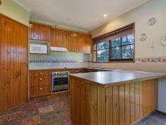 54 Earl Cres Bannockburn VIC 3331 $429,000 - $469,000 Privacy and Location - 1692mt2 Approx Great position and space for the whole family to enjoy. This well cared for home with bull nose verandah sits on a lovely 1692mt2 approx parcel of land with mature trees and gardens giving you ample privacy. The home comprises three bedrooms, two with BIR's and master bedroom with feature bay window, WIR and ensuite. The formal living area features dado timber walls and overlooks the lovely gardens. The dining area, with solid fuel heating, dado walls and raked cathedral ceiling, adjoins the timber kitchen with slate floors, electric cooking and pantry. The bathroom has a fantastic corner spa bath and timber vanity. Outside there is plenty of room to move, single carport at the rear of the home and a single powered and concreted garage. This property will not disappoint, call today to arrange an inspection.