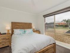 65 Bickford Rd Grovedale VIC 3216 $340,000 - $360,000 It's All Done; so Take it Easy This fantastic home is ready to make your life easier. A central position and updated interiors create a wonderful package for busy families. With the Burdoo sporting reserve, train station, new bypass, community garden, schools and Heyers Rd shopping all close by, it's easy to see how this great position can help you recapture your precious time. Extensive updates leave nothing to do and cover all the big ticket items including soft new carpeting, fresh paintwork, revamped kitchen and bathroom, and modern roller blinds. Stylish interiors are matched by a great floorplan that gives the family 2 living areas and a large alfresco to enjoy. The home opens to the family-sized lounge and flows through to the open-plan living, dining and kitchen. The smart kitchen will win all hearts with black bench-tops, crisp white cabinetry and new stainless steel Westinghouse upright cooker and matching dishwasher. The spacious alfresco is a great place to entertain, and with a wall mounted TV on offer, this is where you'll barrack for your team on Grand Final day. The sun-drenched master bed has a walk-in robe and en suite-style access to the practical 2-way bathroom. The light and cheerful bathroom has a semi-frameless shower and bath, and a door to the renovated powder room. The 2nd and 3rd beds have built-in robes and ample space for bunks or queen beds. Mod cons include a new gas hot water service, gas wall heater, a powerful split-system air conditioner and 8 bill-reducing solar panels with a 2kw inverter. The low-maintenance garden has a huge lawn with plenty of space for kicking the footy with the kids. Two large sheds offer plenty of storage and give the gent's a space to call their own. Secure parking is plentiful with a single garage with roller door and a 2nd gated drive that gives handy access to the garden and secure additional parking for trailers, caravans and vehicles. Are you ready to take it easy? **** All information offered by Ray White Geelong is provided in good faith. It is derived from sources believed to be accurate and current as at the date of publication and as such Ray White Geelong merely do no more than pass the information on. Use of such material is at your sole risk. Ray White Geelong does not have any belief one way or the other as to whether the information is accurate and prospective purchasers are advised to make their own enquiries with respect to the information that is passed on. Ray White Geelong will not be liable for any loss resulting from any action or decision by you in reliance on the information from Ray White Geelong.