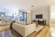 7 Conimbla Ln Aubin Grove WA 6164 Property Information Open Home Dates: Saturday 26 Sep 2:20 PM - 2:40 PM Sunday 27 Sep 2:20 PM - 2:40 PM FIXED DATE SALE ENDS 7th OCTOBER @ 4PM ALL OFFERS PRESENTED!! Magnificent in every sense, this luxurious residence is sure to impress. The property sprawls over a generous 608sqm block with multiple entertaining areas and lush landscaped gardens - taking family living and entertaining to a whole new level! First impressions offer perfectly manicured gardens and a grand facade leading to an impressive portico. Step inside to discover the most glamorous of family homes, where every detail has been carefully considered and realised with no expense spared. A magnificent floor plan echoes the spacious allotment the home is set on with well-proportioned living areas, providing formal and casual designated spaces that span out to an equally impressive alfresco. Quality Spotted Gum timber flooring, high ceilings, beautiful colour schemes and rich finishes feature throughout the home, creating an allure that will not be denied. There is no shortage of space to ensure absolute comfort and convenience. This includes a sumptuous lounge/theatre room, large games room and a separate study or fifth bedroom, as well as the most impressive open plan living and dining domain encompassing the designer kitchen. The centrally located modern kitchen will impress the fussiest of chef's, boasting state of the art appliances, banks of cupboards, Ceaser stone bench tops, overhead storage, induction cooktop, walk-in larder and large fridge recess. Server windows offer easy meal service to the alfresco making summer BBQ's and entertaining a breeze! There are four bedrooms offering the flexibility to accommodate the entire family and guests. All of the bedrooms are wonderfully sized with magnificent storage and stunning decor. This includes the lavish master room, complete with His and Her walk-in wardrobes and lavish ensuite featuring a double shower. The property is further enhanced by a separate powder room and laundry that is brilliantly equipped with intelligent storage solutions. Additional features include ducted reverse cycle air-conditioning, shoppers entry, LED lighting, security alarm, Crimsafe security doors, quality window treatments and a double lock-up garage with additional storage space and access to the rear yard. Outside feels like an extension of the living accommodation with instant access to the fully paved alfresco - ideal for relaxation or simple family dining. The gardens are fully landscaped and reticulated and boasts a garden shed for extra storage. Lifestyle and convenience are paramount with an abundance of parklands at your doorstep. Additionally, the property is very close to Aubin Grove Primary, the freeway, Transperth bus links, and close proximity to Cockburn Central and the upcoming Aubin Grove Train Station, making this place a well-connected family and commuter destination! Please contact us for more information or to arrange a viewing. Property Type House