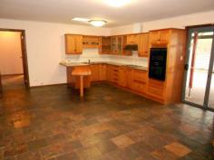 10 Albert Parade Bordertown SA 5268 $230,000 Lovely Brick Veneer Home! This home is neat and tidy with plenty of open space. Featuring three bedrooms, main with walk-in robe, leading to two-way bathroom. The bathroom is a feature on its own with stunning black marble effect tiles, separate w/c and laundry with access to backyard. Spacious Timber kitchen with slate flooring, built in pantry, breakfast bar, meals area and outdoor access. Large sunken lounge and dining area with wood fire and air conditioner. Looking to entertain, step outside to a fully paved, all weather pergola area. Also featuring double attached carport, garden shed, rainwater storage and easy maintained garden. All set on an easily maintained allotment in a quiet residential street.