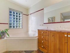 54 Earl Cres Bannockburn VIC 3331 $429,000 - $469,000 Privacy and Location - 1692mt2 Approx Great position and space for the whole family to enjoy. This well cared for home with bull nose verandah sits on a lovely 1692mt2 approx parcel of land with mature trees and gardens giving you ample privacy. The home comprises three bedrooms, two with BIR's and master bedroom with feature bay window, WIR and ensuite. The formal living area features dado timber walls and overlooks the lovely gardens. The dining area, with solid fuel heating, dado walls and raked cathedral ceiling, adjoins the timber kitchen with slate floors, electric cooking and pantry. The bathroom has a fantastic corner spa bath and timber vanity. Outside there is plenty of room to move, single carport at the rear of the home and a single powered and concreted garage. This property will not disappoint, call today to arrange an inspection.