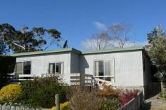 148 Sloping Main Dr Sloping Main TAS 7186 $200,000's PERFECT BEACH HOUSE Over the road from the calm waters of Sloping Main Beach, this comfortable, spacious home has been lovingly maintained and the garden is a joy. With three bedrooms, one of which is currently used as a sitting room enjoying direct access to the rear deck, this low maintenance home has a separate sewing room and a generous living area warmed by a wood combustion heater. The bright, sunny kitchenette has water glimpses of Frederick Henry Bay and a sliding door onto the front deck. Big double carport, workshop, potting house, aviary, studio or sleep-out are among the many other improvements. There is a second vehicle access perfect for your boat. The wood shed is complete with 3 years supply of dry, cut to size firewood for the wood heater. The easy to maintain garden is delightful and attracts a myriad of bird life. Backing onto farmland and just across the road from the beach, this property is well worth a look. Other features: Fireplace(s),Garden,Terrace/Balcony