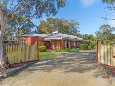 54 Earl Cres Bannockburn VIC 3331 $429,000 - $469,000 Privacy and Location - 1692mt2 Approx Great position and space for the whole family to enjoy. This well cared for home with bull nose verandah sits on a lovely 1692mt2 approx parcel of land with mature trees and gardens giving you ample privacy. The home comprises three bedrooms, two with BIR's and master bedroom with feature bay window, WIR and ensuite. The formal living area features dado timber walls and overlooks the lovely gardens. The dining area, with solid fuel heating, dado walls and raked cathedral ceiling, adjoins the timber kitchen with slate floors, electric cooking and pantry. The bathroom has a fantastic corner spa bath and timber vanity. Outside there is plenty of room to move, single carport at the rear of the home and a single powered and concreted garage. This property will not disappoint, call today to arrange an inspection.