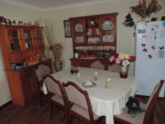 46 Roberts St Balingup WA 6253 $309,500 Located in a quiet street in the pretty tourist town of Balingup. This is a delightful, wheel-chair friendly home on a 1579 m2 block, just a short, flat stroll to the village green, café`s, shops and town amenities. The spacious home has an open plan kitchen/dining and family room. The galley style kitchen is well appointed with all solid wood benches, gas cook top and electric wall oven also a microwave shelf and very adequate cupboards and storage. Dining area has room for a big, 7 piece dining suite and the large family room has reverse cycle air conditioner and a fan forced wood fired combustion heater with ducted heating to the bedrooms also a gas bayonet for an alternative heater. Off the family room is a lovely formal lounge room which has a nice view of the front garden. Master bedroom is King size with very big built in wardrobe reverse cycle air conditioner and wwc. Bedroom 2 & 3 are generous queen size with wwc. All bedrooms share the bathroom which has a very large shower recess, vanity and separate WC. Outside, off the back patio, down a wheel chair friendly ramp, is a very private and shady 7.5 X 7.5 meter entertainment area leading into the delightful gardens, there is a single carport, double garage/workshop and a lovely shade house. The gardens have been extensively landscaped and designed to be low maintenance. At the back of the property is a winter creek which has been lined with stone and across a bridge is a fruit salad orchard with a good mix of about 12 fruit trees. Also well-established vegetable gardens. The home has a 2.5 kw power system ensuring that power costs are minimal, solar HWS and is fully insulated. NOW PRICED TO SELL To book a private viewing of this home please contact John Rich 0429 101 264 Feature Property Air conditioned Air conditioned Alfresco Alfresco Bathrooms : 1 Bedrooms : 3 Carport : 1 Family Family Garage : 1 Insulation Insulation Kitchen/Dining Kitchen/Dining Laundry Laundry Lounge/Dining Lounge/Dining Outdoor Entertaining Outdoor Entertaining Shed Shed Storeys : 1 Verandah Verandah Water Closets : 1 Workshop Workshop Property Map