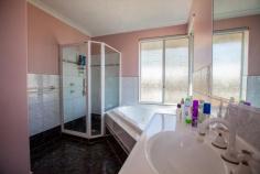 40 Hospital Ave Manjimup WA 6258 $460,000 Ultimate family home with amazing patio and sheds, situated on 2051m2 House - Property ID: 814703 This property boasts size!! With a comfortable modern brick and tile home built by Parella Bros. that features 4 bedrooms and 2 bathrooms. The master bedroom is of large size with a beautiful bay window, walk in robe and ensuite that is well finished and even includes a spa. The other three bedrooms are all of medium size with built in robes and vinyl flooring, perfect for a young family. Open style living with the kitchen working in perfectly with the dining and the family room. The kitchen is well sized with a 900mm stainless steel electric oven and gas cook top with matching stainless steel range hood. A double pantry and open fridge bay of which will also accommodate your freezer. Fantastically designed with shoppers entrance from the double carport at the front. The living area has a wood fire, ceiling fan and sliding glass door access to the patio, perfect for your entertainment requirements. Separate to this open living is the formal lounge which is perfectly tucked away and like the entire home has beautiful large windows to soak up this beautiful block. This 2051m2 block is set up so well. With the double carport leading to a large "L" shaped patio area of nearly 150m2. There is secondary access to the property that leads to the sheds, the main shed is 6m x 12m with cement floor. This shed features both 10 and 15 amp power outlets. The second shed is 3m x 12m and 4.5m high with cement floor, perfect for your caravan or boat. With all this there is still plenty of space out the back and at the front of the home for your children or pets. The back yard is fully enclosed with quality fences. With the added convenience of a solar hot water system which also runs through the wood fire (and additional electric booster), batts insulated ceiling and recently replaced gutters and down pipes what more could you ask for. This property has everything a family could wish for. Don't miss out on such a fantastic opportunity. Print Brochure Email Alerts Features Land Size Approx. - 2051 m2 Built-In Wardrobes Close to Schools Close to Shops Close to Transport Fireplace(s)