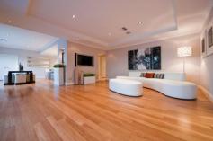 5 Harlequin Pass Southern River WA 6110 $950,000 - $980,000 This elegant and contemporary 4 bedroom, 2 bathroom family home, built by Sovereign Building Company, was an entry in the 2009 HIA-NAB Perth Housing Awards. The modern residence is built over two levels and features a practical floorplan and quality designer finishes throughout. The corner home has a striking street elevation which is highlighted by a huge landmark palm tree. As you enter the house, the wide timber-floored entrance flows past bedroom 4/study to the spacious open-plan living with computer nook and onto the dining area and kitchen then the separate home theatre room. Bi-fold doors open to extend the living room to a poolside alfresco area, which has a built-in kitchen with a pizza oven and is perfect for entertaining. Back inside, you will love the large modern kitchen with island bench which looks out across the dining and living area to the pool and alfresco area. The chefs kitchen includes stainless steel appliances, glass splashback, double sink, appliance cupboards and double door pantry. Off the kitchen is the laundry which has plenty of storage space and stone benchtops. In a wing of their own are the two well proportioned minor bedrooms, each with built-in robes. They share a fully tiled bathroom with twin basins, stone benchtop, spa bath, shower and separate toilet. There is plenty of storage in the house with two large linen presses in this wing. Upstairs, a big balcony is accessed from the landing. Along with city views, it offers a place to enjoy morning coffee, a sunset drink or watch the city fireworks show, with its own benchtop, sink, fridge recess and cupboard. The main suite has an abundance of natural light, a generous walk-in robe and fully tiled ensuite with a shower big enough for two and twin basins. Some of the features you will love about this exceptional home include: o Private grand master suite with walk in robe o Dual basin ensuite featuring floor to ceiling tiling o Grand balcony with city views and outdoor kitchenette o Three well proportioned double bedrooms o Family bathroom with dual basins, spa bath and separate shower o Modern kitchen with feature island bench, huge pantry, lots of cupboard space and stone benchtops o Smeg stainless steel 900mm electric oven, cooktop and rangehood o Generous open plan living area with computer nook o Secluded home theatre o Laundry with stone benchtops and lots of storage o Undercover alfresco area with outdoor kitchen, inbuilt BBQ, pizza oven and café blinds o Swimming pool with water feature o Timber flooring o Reverse cycle air conditioning throughout o Security system for peace of mind o An abundance of storage throughout the house o Double lock up garage with additional storage This beautiful home is located close to Bletchley Park Primary School, parks, public transport and a short drive to the Southern River Shopping Centre and Tonkin Highway. You'll be sure to love this house, so come along to a home open or call to arrange a private viewing.
