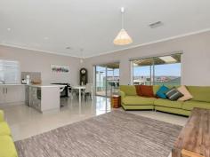 50 Brooklyn Dr Hallett Cove SA 5158 $420,000 Better Than Brand New-Vendor Says Sell All the hard work is done and the quality up-grades predict the ease of living this property offers. The high standard the owners have imposed on their home is evident from the front door. Three Bedrooms main with en-suite and walk-in robe, bedrooms two and three have generous sized built-in robes. High quality tiled floors throughout the main living areas, modern main bathroom, separate toilet and laundry lead to the large open plan kitchen living area. Ceasar Stone bench tops and high gloss finish kitchen cupboards which are soft closing, stainless steel dishwasher and gas stove top with electric oven and Clipsal satin finish light switches finish this stylish area. A sliding door opens out to the covered deck for outdoor entertaining and a shed and water tank are in the easy care turfed back yard. Ducted reverse cycle air-conditioning, temperature controlled gas hot water service, two compliant smoke alarms plus the fact this home is NBN compliant ensures continued low maintenance of this property. Remote control garage door with internal entry from the garage into the home plus the crim-safe front screen door and roller shutters on the front windows add to the security of this home. Hallett Cove's shopping centre is only a minutes drive away and the Cove sporting grounds are within walking distance. Auction Saturday the 26th of September at 10:00am unless sold prior. For more information call Ian Jesse on 0419 806 381