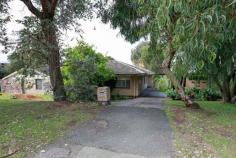 54 Carrick St Woodlands WA 6018 $900K WOOLDANDSThis is probably the worst house in the street but arguably one of the best blocks! This is probably the worst house in the street but arguably one of the best blocks! It is not often that a prime 708m2 building site on the hill in Woodlands, with views to Jackadder Lake and city views, comes onto the market. It is located in a quiet street, centrally located in this suburb, and is accessible to everything including: * Woodlands Shopping Centre is 600 metres away; * Woodlands Primary School is 320 metres away; * Holy Rosary Primary School is less than 200 metres away; * Hale School playing fields are just up Rosewood Avenue; * Churchlands High School is 1.3 kilometers away; and * Newman College is 2.4 kilometres away. Not ready to build immediately? You get a bonus 1967 brick and tile, three bedroom and study, one bathroom house, with a two car carport. The property has some appealing features: * A large light-filled open plan lounge/dining room with parquetry floors and expansive views to the city from the back windows; * A large kitchen with a large separate pantry waiting to be modernized; * The living areas have access to a large back balcony with suburban views; * A large main bedroom with a walk in wardrobe large enough to be converted into an ensuite. * The renovation is made easier because the walk in wardrobe is adjacent to the existing bathroom; * Three other minor bedrooms, two of generous proportions, one with built in wardrobes and the other with a walk in wardrobe. The third has been converted into a study, but could be readily used as a fourth bedroom; * A large bathroom, and separate toilet; * A large laundry with backyard access; * Original wooden floorboards; * A large backyard; and * A double car carport. You will not be paying extra for tasteless renovations because there are none. Just an honest original house!