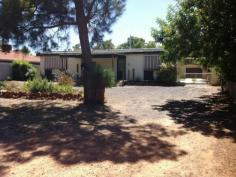 4 Radiata St Coodanup WA 6210 $339,000 This large & comfortable home has great future development potential. Situated on a large, 1113sqm block just moments from Riverview Reserve overlooking the Serpentine River, the property sits in a quiet cul-de-sac opposite a large park. Inside features 4 bedrooms, 2 bathrooms, separate lounge, dining, additional living or games room and , semi-enclosed study off the lounge. Timber floors to main living area and dining, Split system air conditioning, fireplace and good sized, central Kitchen. Exterior features a large, lockable powered shed with built in bar: the perfect man cave. Front and rear verandas; Huge, grassed rear yard; side access and plenty of room to store the boat and trailer. Lots of Potential on Huge Block 4 Radiata Street COODANUP WA 6210 4 2 For Sale $339,000 Inspections Inspections by appointment only. Features General Features Property Type: House Bedrooms: 4 Bathrooms: 2 Land Size: 1113 m2 (approx) Indoor Ensuite: 1 Toilets: 2 Study Workshop Air Conditioning Open Fireplace Outdoor Shed Fully Fenced