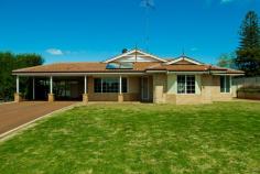 40 Hospital Ave Manjimup WA 6258 $460,000 Ultimate family home with amazing patio and sheds, situated on 2051m2 House - Property ID: 814703 This property boasts size!! With a comfortable modern brick and tile home built by Parella Bros. that features 4 bedrooms and 2 bathrooms. The master bedroom is of large size with a beautiful bay window, walk in robe and ensuite that is well finished and even includes a spa. The other three bedrooms are all of medium size with built in robes and vinyl flooring, perfect for a young family. Open style living with the kitchen working in perfectly with the dining and the family room. The kitchen is well sized with a 900mm stainless steel electric oven and gas cook top with matching stainless steel range hood. A double pantry and open fridge bay of which will also accommodate your freezer. Fantastically designed with shoppers entrance from the double carport at the front. The living area has a wood fire, ceiling fan and sliding glass door access to the patio, perfect for your entertainment requirements. Separate to this open living is the formal lounge which is perfectly tucked away and like the entire home has beautiful large windows to soak up this beautiful block. This 2051m2 block is set up so well. With the double carport leading to a large "L" shaped patio area of nearly 150m2. There is secondary access to the property that leads to the sheds, the main shed is 6m x 12m with cement floor. This shed features both 10 and 15 amp power outlets. The second shed is 3m x 12m and 4.5m high with cement floor, perfect for your caravan or boat. With all this there is still plenty of space out the back and at the front of the home for your children or pets. The back yard is fully enclosed with quality fences. With the added convenience of a solar hot water system which also runs through the wood fire (and additional electric booster), batts insulated ceiling and recently replaced gutters and down pipes what more could you ask for. This property has everything a family could wish for. Don't miss out on such a fantastic opportunity. Print Brochure Email Alerts Features Land Size Approx. - 2051 m2 Built-In Wardrobes Close to Schools Close to Shops Close to Transport Fireplace(s)