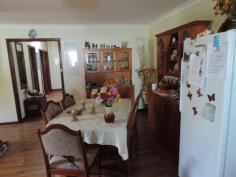 46 Roberts St Balingup WA 6253 $309,500 Located in a quiet street in the pretty tourist town of Balingup. This is a delightful, wheel-chair friendly home on a 1579 m2 block, just a short, flat stroll to the village green, café`s, shops and town amenities. The spacious home has an open plan kitchen/dining and family room. The galley style kitchen is well appointed with all solid wood benches, gas cook top and electric wall oven also a microwave shelf and very adequate cupboards and storage. Dining area has room for a big, 7 piece dining suite and the large family room has reverse cycle air conditioner and a fan forced wood fired combustion heater with ducted heating to the bedrooms also a gas bayonet for an alternative heater. Off the family room is a lovely formal lounge room which has a nice view of the front garden. Master bedroom is King size with very big built in wardrobe reverse cycle air conditioner and wwc. Bedroom 2 & 3 are generous queen size with wwc. All bedrooms share the bathroom which has a very large shower recess, vanity and separate WC. Outside, off the back patio, down a wheel chair friendly ramp, is a very private and shady 7.5 X 7.5 meter entertainment area leading into the delightful gardens, there is a single carport, double garage/workshop and a lovely shade house. The gardens have been extensively landscaped and designed to be low maintenance. At the back of the property is a winter creek which has been lined with stone and across a bridge is a fruit salad orchard with a good mix of about 12 fruit trees. Also well-established vegetable gardens. The home has a 2.5 kw power system ensuring that power costs are minimal, solar HWS and is fully insulated. NOW PRICED TO SELL To book a private viewing of this home please contact John Rich 0429 101 264 Feature Property Air conditioned Air conditioned Alfresco Alfresco Bathrooms : 1 Bedrooms : 3 Carport : 1 Family Family Garage : 1 Insulation Insulation Kitchen/Dining Kitchen/Dining Laundry Laundry Lounge/Dining Lounge/Dining Outdoor Entertaining Outdoor Entertaining Shed Shed Storeys : 1 Verandah Verandah Water Closets : 1 Workshop Workshop Property Map