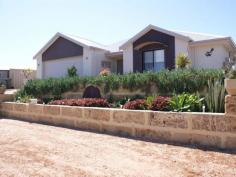 39 Premier Cir Dongara WA 6525 Reserve Set to Sell 4 bedroom 2 bathroom home with loads of extras. Starting with separate lounge, activity-computer room, office and dining living area opening out to the garden. Fully ducted aircon, modern kitchen with stone benchtops and splashback With the sellers keen to move now is the time to take a look and grab a quality built home. Make an offer. 779SQM Block Ring Peter Bradley 0427 218 511 Email: peter.bradley@raywhite.com