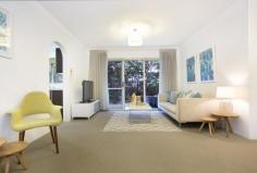 2/8 Chandos Street Ashfield NSW 2131 Peaceful and private garden apartment Fresh interiors, plentiful outdoor living space and a spacious layout give this ground floor apartment a cottage-like feel. One of only nine in the well-kept Locksley Hall, this 85sqm apartment benefits from direct level access to leafy common gardens and is just 450m to the station and Ashfield Park. • Quiet and private setting in a tightly held security block • Easy level access, an affordable alternative to a semi • 2 large bedrooms with built-ins and a leafy garden outlook • Freshly schemed interiors, separate living and dining zones • Bright and spacious kitchen with an adjoining laundry room • Paved outdoor dining terrace overlooking a leafy garden • Easy internal access to a lock-up garage, low strata levies • Bright and airy with potential to renovate and add value