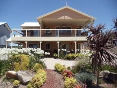 41 Grahn Rd Sandilands SA 5571 $438,000 Stunningly Located Coastal Home Why build when you can just walk into a home like this? With spectacular sea views across the gulf, this 2 storey home is in new condition perched high in the heart of James Well and set amongst other quality homes. The magnificent balcony, with its panoramic sea views, has access from both the living room and master bedroom and being approximately 10m x 4m (with over half undercover of the main roof) is easily large enough to entertain many of your closest friends. Comprising 4 bedrooms, master upstairs with built in robes, dual access ensuite including double shower, spacious open living, dining room and kitchen with dishwasher, double sink and ample bench space. Reverse cycle split system air conditioning and tiles throughout the living areas make life even more comfortable if that's possible. Down stairs are bedrooms 2, 3, and 4, a second living area, laundry and the main family bathroom. Several built in storage options are also available throughout the home. The front and rear yards are low maintenance and rain water storage of approximately 45,000 litres is available while under cover parking is provided by means of the gable roofed carport. James Well is located approximately 6 kilometres south of Ardrossan and this relaxing hamlet is a combination of permanent residents and people just enjoying some time away from the hustle and bustle of everyday living while still only 100 minutes from Adelaide. This premier property deserves your attention so contact Scott Bockmann at our Ray White Ardrossan Office on 0427 519 628 to arrange your inspection today.