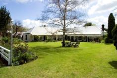 269 Dingup Road Manjimup WA 6258 $1,495,000 HISTORY NEVER TO BE REPEATED!! TWO HOMESTEADS! 45 ACRES! House - Property ID: 814655 Rare chance to live the country life dream on an historic property settled in 1870. Dingup House is one of few surviving homesteads in this part of the South West. The main homestead, huge barn and shearing shed have been lovingly restored. This historic home has an excellent commercial kitchen, 30 seat dining room with huge log fireplace, magnificent lounge room with wood fire, charming parlour room, 6 bedrooms and 5 bathrooms an office and much more. Adjacent and joined by a breeze way to the main homestead are separate living quarters. This incredible home is surrounded by sweeping lawns, a grass tennis court, many deciduous trees, and cottage gardens, all reticulated from a very good dam. This amazing property has huge potential having been run as a very successful Bed and Breakfast and Restaurant in the past. Dingup House would make a perfect Retreat, there is potential to build chalets and capitalise on the self contained accommodation market, these are just a few of the potential uses for this incredible property. Situated on the same property is a new three bedroom two bathroom plus office, home with open plan living area with galley ceilings and black butt flooring, nice verandahs and entertaining timber deck. Also on the property is a massive shed with 3 phase power, which is over 900sqm in size. This rare Heritage property must be seen to be fully appreciated. Please call Kathy Savage on 0417 965 923 for further details. Print Brochure Email Alerts Features Land Size Approx. - 18.18 hectares Fireplace(s) Garden Polished Timber Floor Formal Lounge Separate Dining Historic Stunning gardens