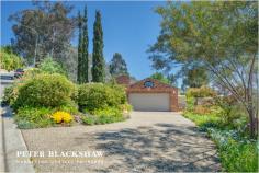 6 Minehan Pl Calwell ACT 2905 Positioned in one of Calwells best locations, with outstanding Views! With the owners moving north an outstanding opportunity exists for one lucky buyer to purchase an impressive home. Set aside some time to come and view this immaculate property. Located in an elevated quiet cul-de-sac on a large but maintenance friendly 1,603m2 block, this is an striking home of design and construction. Exceptional views to the north are the first thing to capture your attention but to truly appreciate this home you need to have a look inside. Split level living at its finest with four double sized bedrooms, study, lounge, dining, family, rumpus and living rooms. With good quality floor covering, fitting and fixtures this home is sure to please the astute purchaser. When venturing outside you will be amazed with not just the views but the impressive attention to detail with an outstanding garden with many chill out zones • First time offered for sale • Large home with four bedrooms and ensuite and rumpus room. • Huge 1603m2 parcel of land with views to Black mountain tower • Flexible floorplan complete with a variety of living areas • North facing solar passive living areas with views • Large paved outdoor living area • In-floor zoned heating • Bay window meals area • Large kitchen with breakfast bar and gas cooking • Extra-large double garage with internal access and remote control doors • Immaculate condition inside and out Residence 271.79m2 Garage 55.25m2 Total 327.04m2 Inspection is highly recommended! Additional Information Land Area (approx) 1603 sqm Building Size (approx) 327.04 sqm Energy Rating 2.0