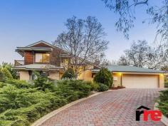 58 Heritage Dr Roleystone WA 6111 $639,000 SUNBLESSED VISTA'S ... Constructed by award winning hills builder ‘Custom Built Homes’ on a prestige half acre lot, this lovely split level elegant residence has been successfully designed with the vision to capture an all encompassing hills lifestyle by being immersed in glorious valley vista’s and a private secure locale. Adopting a true north orientation for solar passive principles, this four large bedroom, two sparkling bathroom home features free flowing sun-drenched interiors for relaxed casual living that highlights multiple separate living areas including open plan and private space with a fabulous second storey retreat ideal for a studio/theatre space, here all the family is catered for. Climate control within the residence is very ably managed via four reverse cycle split system air-conditioners plus a romantic slow combustion fire place. The location is second to none with a proud elevated street position complete with a variety of fruit trees and open spaces for children and pets to play. For car cover, a double garage with auto garage door plus store space and plenty of general parking is available. What a fantastic opportunity to secure this beautiful family home in the world renowned Araluen Country Club Estate... Open for Inspection By Appointment Land Area 2,258 sqm