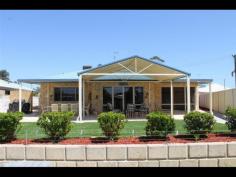 2 Tanderra Pl South Yunderup WA 6208 $619,000 CANAL FRONT LIVING / 1031m2 BLOCK 4 2 2 1,031 sqm * There is a feeling of space as soon as you enter this modern 4 bedroom, 2 bathroom waterfront property. With its large entrance hall, high ceilings and spacious open living areas taking in the water views, there is loads of space for the whole family to enjoy and entertain your guests. * The front lounge/TV room is off the entrance along with the master suite keeping it separate from the minor bedrooms to the other side of the home. The large pitched patio is perfect for outdoor dining/entertaining and overlooks your own private jetty with provisions for a slipway for the boat. * The unique 1031m2 lot allows for extra parking for boats, caravans and trailers which is rare for these canal front properties. Parklands and a waterfront walking track are straight across the road, perfect for the morning walk with the dog and room for the kids to play. * The home has ducted air conditioning, easy care lawns and gardens plus secure parking for two vehicles in the garage/workshop. Additional information Property Type House Property ID 11869100405 Street Address 2 Tanderra Place Suburb South Yunderup Postcode 6208 Price $619,000 Land Area 1,031 sqm