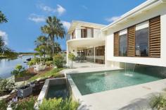 32 North Point Banksia Beach QLD 4507 $1,695,000 FIXED COMMISSION At Harriet Lee Property you know you are onto a winning formula. Of course not only do you save those valuable dollars with Harriet Lee's Fixed Commission, at $5850 +GST, you know you are working with a real property agent with a real passion for her clients property needs This imposing family home sits proudly on a large North Facing 1,021m2 block and boasts 20 metres of unobstructed waterfront. From the moment you enter through the 3.3 metre high pivot feature door you will be mesmerised by that water view. This home has been designed to embody everything the Queensland lifestyle offers and was once featured in “Queensland Homes”. Every space within this impressive home has been thoughtfully designed around water vistas. Entertain family and friends all year round. With two alfresco dining areas you can choose to entertain by the pool or overlooking the canal. An elegant use of timber joinery and flooring is perfectly balanced against a clean white palette to create a sense of calm sophistication. 4.4 metre high ceilings over the living area provide the grandeur you expect from a property of this stature. Quality of build and design is evident to all who enter and the astute buyer will not be disappointed. Features: Quality construction with a combination of core filled concrete block and commercial brick veneer, walls and ceilings insulated, first floor suspended concrete slab, comfort plus glazing Stunning 25 metre pool with rimless glass surround Huge foyer entry – see that mesmerising view as soon as you walk in Bright, open plan living and dining area with enviable views to the pool and canal 4.4 metre high ceiling to the living area provides further grandeur to the home Gourmet kitchen with quality Miele & Bosch appliances, including coffee machine, wine fridge, dishwasher, induction hob, water purification etc Boasting 4 bedrooms each featuring ensuite bathrooms, walk in robes, air conditioning and private north facing balconies with water views The master suite possesses an opulent ensuite with spa, two walk in robes and magnificent water and mountain views Energy efficient design with 5 star passive solar designs, solar power generation system, UPS battery power back up system and energy efficient Daikin VRV air conditioning Monitored Intruder Alarm System and Deltacom Intercom for front gate entry Dual electric hot water system depending on occupancy. Rainwater harvesting system including a 7,500 gallon underground cast tank and automatic water irrigation system Brisbane Airports approximately 40 minutes away Fit in a game of golf at the prestigious Pacific Harbour Golf and Country Club. Enjoy the sunsets over the Glass House Mountains. Indulge in the luxurious and prestigious waterfront lifestyle this home offers.