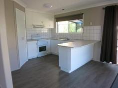 9 Lawson St Dalby QLD 4405 $284,000 FABULOUSLY FRESH - INSIDE & OUT Ideal retirement residence - nothing to do! Located in flood-free Pioneer Gardens (western side of Dalby) Hardiplank construction on pier & beam foundations. Large residential block of 896m2 on quiet street. New external & internal paintwork, new light fittings, new doors, new floor coverings. 3 good size bedrooms with built-ins (hanging space and shelving). Kitchen - new bench/sink, near new electric stove, rangehood, pantry. Dining/lounge combination with reverse cycle air-con, ceiling fan. Hallway with mirrored door linen storage cupboard. Tiled bathroom with bath, shower recess, new vanity/cabinet, fan light. Separate toilet. Laundry with side door access, storage cupboard. Climate control: RC air-con in lounge. Ceiling fans in lounge and main bedroom. Flooring: Cushion vinyl with wide plank timber look, plush carpet. Windows: screens, security, curtains, roller blinds. Aluminium shade awnings. Colorbond fenced backyard. Clothesline with paver path. Covered side deck with metal railings, ideal for entertaining. Established trees/garden. Garden shed. Carport for 2 vehicles with brick flooring, shade cloth on western end.