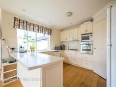 2/40 Burt Street Mount Clarence WA 6330 $599,000 THE LOOKOUT For Sale Home is a place where a large portion of your time is spent, time that is for relaxation and rejuvenation from your busy work lives, so it is important that your abode be a place of escape and full of pleasantries. This elegantly designed executive townhouse achieves just this, with a backdrop of the ocean to sooth and refresh, reminding you that some of the best things in life are free. Located towards the rear of the high class community which itself is tucked away within a cul de sac, the peace and quiet is pure bliss to accompany the view. A private double remote garage and paved additional guest parking area as well as nicely manicured gardens greet you as you approach the home. Textured cream render creates a regal feel as the grand two story structure towers above you, impressing with its stature and classy minimalistic style. Stepping inside via the white entrance doors, a bright and sizable entrance hall creates leading lines to the solid wood feature staircase, as well as into the multi-tiered lower level bedroom wings and conveniences. The first port of call is the spacious master bedroom, with triple awning windows, walk in robes for him and her either side of the ensuite entrance, and the ensuite itself which features marble look tiles, a glass shower, crisp white vanity and toilet. Steps lead up from the entrance hall to the separate hallway with its own door that introduces the minor bedroom wing. Within it is the second bathroom, family sized and featuring a luxurious two person raised spa bath, the perfect tonic for any aches and pains (glass of vino in hand, of course!). It also features a recess shower, vanity and its own skylight amongst bright, neutral tones. Each of the three minor bedrooms are generously proportioned, featuring build in robes and awning windows to control that beautiful afternoon breeze. Another set of steps from the entrance hall leads downwards to additional walk in storage, garage access and a laundry of epic proportions including plenty of room for additional fridge and freezer space and its own laundry chute from upstairs. Ascending the homes main feature staircase, you then experience that wow factor element of the home. As you reach the top, a huge open plan family living area and kitchen opens out in front of you. Well, we think it does... We were too distracted by the panoramic millionaire's views of Middleton Beach and the Harbour to notice!! A full wall of windows makes sure that this is capitalised on to its full extent. Double French doors lead through into a formal lounge room, floating floorboards create a warm and modern feel, and the spacious kitchen has all of the storage, bench space, breakfast bar room and modern stainless steel appliances you could ever need. Air conditioning keeps the air toasty or cool, depending on the season, while elegant curtains provide privacy if you desire. You even have your own petit sheltered al fresco deck just beside the kitchen including a private wire balustrade stairway down to the main yard. The homes yard is spacious enough to enjoy, yet not too hefty that maintenance becomes overwhelming. Surrounded by rendered fencing, it's a private little possie to be enjoyed. Make home your escape in this townhouse just made for busy lives. The occupants have now vacated and the home is ready for you to move in. What you should know: - High class executive townhouse - Exceptional Middleton Beach views - Proximity to schools and town - Compact yet effective yard - Private double garaging - Zoned Residential Sale Details $599,000 Features General Features Property Type: Townhouse Bedrooms: 4 Bathrooms: 2 Land Size: 597 m2 (approx) Indoor Ensuite: 1 Toilets: 2 Indoor Spa Built in Wardrobes Split system Air Conditioning Air Conditioning Outdoor Garage Spaces: 2 Inspections Inspections by appointment only.