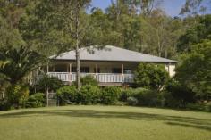 169 Lamington National Park Rd Canungra QLD 4275 $639,000 High on a Hill Catch the breezes and the views from the spacious veranda from this delightful Queenslander. Superbly finished Homestead with: * 4 Bedrooms, * Ensuite off main bedroom, * Huge Carport adjoining the entertainment room with a bar. All this on 5 acres (2.03 Ha) & only 1 and a half kilometres to Canungra Township. Offered for sale at $639,000 Call Canungra Realty today for an inspection House 4 2 Price Guide $639,000 For Sale Land size 2.0300 hectares Inspection times Contact agent for details