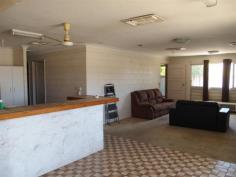 18 Wilga St Blackwater QLD 4717 Light Industrial Land, 2001m2 Block! Set on 2001m2 (approx) of light industrial land in Wilga St, Blackwater is this property with 6 bedrooms, lounge, 2 x kitchens and 2 bathrooms! 3 large shed joined onto the back to make the possibilities endless. With some renovating required, you can personalize your business/home. Features Include; ? 2 x Kitchens ? 6 x Bedrooms ? 2 x Bathrooms ? Open Lounge Area ? Outdoor Entertaining Area ? 3 Good Sized Workshops ? Offices in each Workshop ? Living Quarters on Property ? Fully Fenced Yard with Gates ? 2,001m2 (approx) Light Industrial Land This type of property on light industrial land could have a lot of benefits with workshops, offices and bedrooms all tied into one! Inspections Inspections by appointment only. For Sale Auction Date & Time Fri, 04 Dec 11:00 AM - Auction Auction Features General Features Property Type: House Bedrooms: 6 Bathrooms: 2 Land Size: 2001 m2 (approx) Indoor Toilets: 2 Outdoor Carport Spaces: 1 Garage Spaces: 3