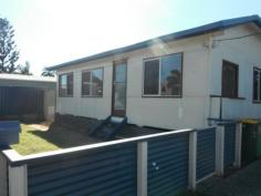 91 Cordingley St Yeppoon QLD 4703 $270,000 Lowset property in Yeppoon with loads of Potential !!!!!!!!!!!!!!!!!!!! * 3 bedrooms with near new carpet *Tidy kitchen,dining, lounge room all have tiled flooring. *This property has just had a new roof and was painted internally in 2014 * Fully fenced yard. * Plenty of room for swimming pool or shed. * Located short distance to shopping centres/ primary and secondary schools and the Beach * Great tenant in place paying $270 per week For Sale $270,000 Features General Features Property Type: House Bedrooms: 3 Bathrooms: 1 Land Size: 620 m2 (approx) Indoor Toilets: 1 Air Conditioning Outdoor Garage Spaces: 1 Other Features Close to Schools, Close to Shops, Close to Transport, Garden, Polished Timber Floor Inspections Inspections by appointment only.