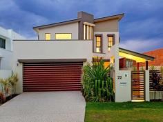 22 Onshore Pl Helensvale QLD 4212 $1,150,000 This 385sqm home sits on a magnificient North facing block. It includes a separate 13 metre marina berth for the seroius "boaties." The use of timber floors throughout further promotes the nautical theme. There has been some serious attention to detail with this property & this is reflected in it's simply elegant ambience. Additional features include- 4bedrooms + media room & 2 separate living areas. Outdoor entertaining area overlooking the swimming pool. 2 bathrooms + powder room Triple garage or double garage with work shop. High ceilings on both levels with ducted air conditioning. One of the more sort after positions within the river links estate. Contact Richard on 0423588890 to arrange an inspection. Energy Efficiency Rating: 0.0-star NABERS Energy Rating Inspections Inspections by appointment only. Features General Features Property Type: House Bedrooms: 4 Bathrooms: 2 Land Size: 446 m2 (approx) Indoor Ensuite: 1 Living Areas: 2 Toilets: 3 Alarm System Study Floorboards Built in Wardrobes Dishwasher Ducted Cooling Outdoor Remote Garage Garage Spaces: 3 Open Car Spaces: 2 Deck Outdoor Entertaining Area Swimming Pool - Inground Eco-friendly