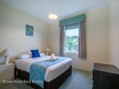 5/21 Adelaide Crescent Middleton Beach WA 6330 $360,000 RETREAT AND REMINISCE For Sale As a child, most of us would have experienced the delight of holding a seashell up to our ear and hearing the ocean, no matter where we were. In this incredible holiday unit, you don't need the seashell to experience this phenomenon, with the blissful sound of the waves forming a constant soundtrack to your lives. This perk is born from the fact that the unit is located just moments away from the iconic Middleton Beach, making your stay in the unit a very rewarding one indeed. As an investment, these units have always been in hot demand due to the perk of being able to occupy the place for a few months of the year to benefit from its location and charming style, while gaining an income from it for the rest of the year- it's a win-win. Located within a peaceful, French styled complex, the approach to the unit is graced with manicured gardens and rose bushes, charming from the first impression. At the front of the unit is an exclusive front carport, while extra guest parking can be found nearby. Step up to the shaded front veranda, with a mini outdoor setting that can admire the surrounds on a quiet afternoon when you are not off making the most of the beach or the sights of Albany. Stepping inside, you are welcomed into the semi open plan lounge room of the home, cosy, homely and adorned with soft decor tones and terracotta tiled to give it a light and airy but slightly European feel. The homes kitchen is slightly tucked away and features all of the space and style you need to make holiday living easy! An upright oven and stove combined with extensive bench and storage space, a separate pantry and a window that gazes out to the charming external courtyard space. Double glass doors from the dining room provide access to the outdoor area which is perfect for enjoying a platter of cheese and accompaniments, and a glass of wine foraged from the Great Southern's food trail. A nicely tucked away laundry portico also features in the downstairs section. A carpeted staircase leads up to the homes two generous queen sized bedrooms, each featuring a large windows that overlooks the garden courtyard of the complex, again channelling a European village feel. Placed between them is the unit's bathroom which features a glass corner shower, storage vanity and toilet amongst light bright tones. Now you have explored the home, let's explore the surrounds- starting with the charming cafe that lies at the entrance of the complex, the gourmet cafe and deli and wine bar that are just a few steps away, and the quaint little gift shop where you can acquire beautiful little finds after a hard days relaxing. Continuing further, the Middleton Beach hub features two more bars and restaurants, stunning walk and bike trails, playgrounds and of course, the unbeatable white sand and crystal water of the beach itself. An investment that offers no hassle professional management, you can be as relaxed throughout the year as you are when you are making the most of the home for your holidays! What you should know: -Stylish and homely holiday unit -Located within professionally managed complex -Moments from beach, bars, restaurants and trails -Spacious open plan living and second story bedrooms -Private parking and guest parking Sale Details $360,000 Features General Features Property Type: Townhouse Bedrooms: 2 Bathrooms: 1 Indoor Toilets: 1 Built in Wardrobes Open Fireplace Outdoor Secure Parking Carport Spaces: 1 Courtyard Outdoor Entertaining Area Inspections Inspections by appointment only.