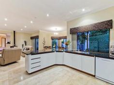 14 Ulric Court Duncraig WA 6023 $1,295,000 GRAND OPENING THIS SATURDAY 12-1 & SUNDAY 2.15-3pm Be quick to secure this absolutely amazing 4 bedroom, 2 bathroom family home. Perched high on a high with sweeping westerley views over the Indian Ocean this immaculately maintained home was built by the current owners and maintained to the highest of standards. Set in a quiet cul-de-sac where many of the neighbours have residented for decades, this home is ideal for bringing up your family in a wonderful location. Features of this beautiful home include: * Spacious 4 bed, 2 bath family home with double lock up garage. * Master bedroom with huge ensuite, spa and balcony with ocean views! Not to mention the massive built in robes. * Large balcony ideal for watching the sun setting over the ocean. * Modern and practical kitchen with stone bench tops, walk in pantry, dsihwasher & lots of storage. * An abundence of living areas allows all family members to have their own space including an open plan lounge and dining room, theatre room/bar, meals area and sitting room. Plenty of space for all! * Indoor garden with water feature providing a tranquil setting. * Impressively large outdoor entertainment area with built in BBQ! * Manicured and reticulated gardens. * Generous 971sqm landholding. This truly is an absolutely magnificent home and for this reason you really have to be quick to make it yours! Features Outdoor entertainment area Spa Ocean views Barbecue Balcony Property Details Bedrooms 4 Bathrooms 2 Garages 2 Off Street Parking 2