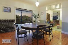 69 Blackwood Dr Ferny Hills QLD 4055 $699,000 Property Information Open Home Dates: Saturday 28 Nov 2:30 PM - 3:00 PM This stunning family home is just waiting for you. Enjoy the special ambience that is created with the careful blending of old and new. Enjoy the timeless appeal of polished floors, high ceilings and the charm of the quintessential Queenslander artfully combined with the needs of the modern family- an awesome designer kitchen featuring an Ilve gas cooktop and oven and Asko dishwasher, a seamless blend of entertaining spaces from indoor to outdoor and flowing to a magical inground pool and a unique entertainer's verandah with glimpses of the city lights, and the livability of separate formal and informal living spaces. For your added consideration: Four special bedrooms - a master suite with modern ensuite Two bathrooms including the family bathroom with a period style clawfoot bath Formal lounge with a slow combustion heater for those chilly nights Formal dining flowing to the verandah Family room with computer station adjacent to the kitchen Awesome designer kitchen with glass splashbacks and European appliances Outdoor entertainment room flowing from the kitchen Sensational in-ground saltwater pool Polished floors throughout the home Verandah enclosed by custom made restaurant blinds Views to the City Double lock up garage plus extra parking space for a boat or caravan Landscaped gardens on 893sqm block Rainwater tank - 5,000litres Solar panels - 6kw Patricks Road State School catchment Nestled on an elevated 893sqm to take advantage of prevailing breezes in the summer and morning sun in the cooler months, the location of this home also benefits from its proximity to essential services. 300m Fernlands local shopping centre with café 400m Bus connections to Ferny Grove Transport Hub 3.1kms Ferny Grove Train Station 2.5kms Patricks Road State School Ferny Hills is located only 12kms from the Brisbane CBD and is graced with mature trees, parks and bikeways which meander throughout the suburb. It is appreciated by families who enjoy the close proximity of excellent schools and childcare centres and by residents who embrace the 'green' nature of the suburb and the easy access to doctors, transport links, sports clubs and recreation facilities. Ferny Hills is also being recognized as a safe suburb for families and is ideal for children of all ages being serviced by multiple sport and recreation clubs and safe neighbourhood parks and a local swimming pool. Land Size 893 sqm Property condition Good Property Type House House style Queenslander Garaging / carparking Double lock-up, Auto doors, Off street Construction Timber Roof Colour steel Insulation Ceiling Walls / Interior Gyprock Heating / Cooling Split cycle a/c, Ceiling fans Electrical Phone extensions Property Features Safety switch Kitchen Designer, Open plan, Dishwasher, Upright stove, Breakfast bar, Gas bottled, Pantry and Finished in Laminate Living area Separate living, Formal lounge, Formal dining Main bedroom King, Walk-in-robe and Ceiling fans Ensuite Separate shower Bedroom 2 Single and Built-in / wardrobe Bedroom 3 Single and Built-in / wardrobe Bedroom 4 Single Workshop Combined Views Urban Aspect North Outdoor living Pool (Inground, Salt and Security fencing), Garden, BBQ area, Deck / patio, Verandah Fencing Partial Land contour Flat to sloping Grounds Landscaped / designer Water heating Electric Water supply Town supply, Tank (size: 5000) Sewerage Mains Locality Close to schools, Close to shops, Close to transport