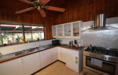 472 Veresdale Scrub School Rd Veresdale Scrub QLD 4285 $550,000 Negotiable WIDE OPEN SPACES AND LOADS OF ROOM WITHIN 5 BEAUTIFUL ACRES. Ideal property for those seeking peaceful living with country views. This outstanding offering to market features an elevated block with a contemporary style home. Designed to maximise the benefits of the property this home includes an Open Plan Living with sunken lounge and cathedral ceilings.The kitchen is fully functional with Freestanding Stainless Steel Cooker, dishwasher and breakfast bench. A sunken lounge takes advantage of the views to the country surrounds and hills beyond with access to the front veranda. The home boasts four bedrooms all with built-in robes, each bedroom is substantial in size with an ensuite and walk-in robe to the Master. Downstairs another living area provides room for children or an additional study area with a large storage room behind. Outdoor entertaining is easily accommodated with paved patio - BBQ area and above ground Pool. A fully self-contained Granny Flat gives living options for visiting relatives or grown up children desiring some privacy. The property includes a 12 x 6m Colourbond Shed for machinery, cars or storage..Complete with two paddocks and plenty of room for pets and children, this property offers a lifestyle choice not readily available to many. Above Ground Pool, Balcony, Broadband, Built In Robes, Courtyard, Deck, Dishwasher, Ensuite, Floorboards, Fully Fenced, Grey Water System, Open Spaces, Outdoor Entertaining, Pay TV, Rumpus Room, Secure Parking, Shed, Solar Hot Water, Split System AirCon, Water Tank, Workshop, PROPERTY DETAILS Price $550,000 Negotiable Property Type House Property ID 2950411 4 2 5