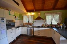 44 Duncan St Canungra QLD 4275 $475000 'BIRDS EYE VIEW, GREAT LOCATION" Elevated four bedroom home all with built in robes, on a large 1300m2 block only a 2minute walk from the centre of town, which is a comfortable 15 minute drive to the Pacific Hwy at Nerang. This Tri Level home has some great features including Australian Jarrah Timber floors, open plan kitchen, lounge, dining room with Cathedral ceilings and access to Veranda and entertainment area. Lovely Cool Salt Chlorinated swimming pool, double garage, with exceptional views of the Ranges. This is a rare opportunity to acquire a property in this location and is a must to inspect. Balcony, Broadband, Built In Robes, Dishwasher, Floorboards, Fully Fenced, In Ground Pool, Outdoor Entertaining, Pay TV, Secure Parking, Shed, PROPERTY DETAILS Price Offers Over $475000 Property Type House Land Size 1300 M2 Property ID 2963779 4 1 2
