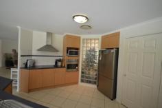21-23 Cherry Tree Court Canungra QLD 4275 $699,000.00 Negotiable "SURE TO IMPRESS" All that you have ever dreamed of is here in this magnificent; 371m2 four bedroom home, all with built in robes, the master with a large walk-in and ensuite. The Architect designed home has been especially cherished by the current owners, with almost four acres of beautifully maintained and manicured gardens with a large Dam & pump that irrigates the gardens, with a separate huge area for growing Organic Vegetables, with mature trees giving sufficient shade for those warm summer days, yet open enough to enjoy the clear moon and starlight evenings, this is a property you must inspect! When you walk through the double front doors into the entrance Foyer of this spacious home with fully tiled floors to all living areas, the open plan home has been designed as an entertainer, with open plan kitchen with island benches, with a dish washer, a large dining area / sunroom that overlooks the 10 X 6 mtr salt chlorinated in ground pool and large undercover entertainment area. A Double Garage with remote controlled doors. Plus a separate 6X6 mtr Colourbond Double garage, and a detached cubby house or office. This property is situated in the Gold Coast Hinterland a short 5 minute drive from the popular Country Town of Canungra, which is a comfortable 20 minute drive to Nerang & the Pacific Hwy. Broadband, Built In Robes, Courtyard, Dishwasher, Ducted Cooling, Ducted Heating, Ensuite, Fully Fenced, Grey Water System, In Ground Pool, Open Spaces, Outdoor Entertaining, Pay TV, Secure Parking, Shed, Solar Hot Water, Solar Panels, Water Tank, Workshop, PROPERTY DETAILS Price $699,000.00 Negotiable Property Type House Land Size 1.5900 Hectares Property ID 2956523 4 2 4