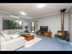 58 Heritage Dr Roleystone WA 6111 $639,000 SUNBLESSED VISTA'S ... Constructed by award winning hills builder ‘Custom Built Homes’ on a prestige half acre lot, this lovely split level elegant residence has been successfully designed with the vision to capture an all encompassing hills lifestyle by being immersed in glorious valley vista’s and a private secure locale. Adopting a true north orientation for solar passive principles, this four large bedroom, two sparkling bathroom home features free flowing sun-drenched interiors for relaxed casual living that highlights multiple separate living areas including open plan and private space with a fabulous second storey retreat ideal for a studio/theatre space, here all the family is catered for. Climate control within the residence is very ably managed via four reverse cycle split system air-conditioners plus a romantic slow combustion fire place. The location is second to none with a proud elevated street position complete with a variety of fruit trees and open spaces for children and pets to play. For car cover, a double garage with auto garage door plus store space and plenty of general parking is available. What a fantastic opportunity to secure this beautiful family home in the world renowned Araluen Country Club Estate... Open for Inspection By Appointment Land Area 2,258 sqm