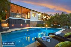 69 Blackwood Dr Ferny Hills QLD 4055 $699,000 Property Information Open Home Dates: Saturday 28 Nov 2:30 PM - 3:00 PM This stunning family home is just waiting for you. Enjoy the special ambience that is created with the careful blending of old and new. Enjoy the timeless appeal of polished floors, high ceilings and the charm of the quintessential Queenslander artfully combined with the needs of the modern family- an awesome designer kitchen featuring an Ilve gas cooktop and oven and Asko dishwasher, a seamless blend of entertaining spaces from indoor to outdoor and flowing to a magical inground pool and a unique entertainer's verandah with glimpses of the city lights, and the livability of separate formal and informal living spaces. For your added consideration: Four special bedrooms - a master suite with modern ensuite Two bathrooms including the family bathroom with a period style clawfoot bath Formal lounge with a slow combustion heater for those chilly nights Formal dining flowing to the verandah Family room with computer station adjacent to the kitchen Awesome designer kitchen with glass splashbacks and European appliances Outdoor entertainment room flowing from the kitchen Sensational in-ground saltwater pool Polished floors throughout the home Verandah enclosed by custom made restaurant blinds Views to the City Double lock up garage plus extra parking space for a boat or caravan Landscaped gardens on 893sqm block Rainwater tank - 5,000litres Solar panels - 6kw Patricks Road State School catchment Nestled on an elevated 893sqm to take advantage of prevailing breezes in the summer and morning sun in the cooler months, the location of this home also benefits from its proximity to essential services. 300m Fernlands local shopping centre with café 400m Bus connections to Ferny Grove Transport Hub 3.1kms Ferny Grove Train Station 2.5kms Patricks Road State School Ferny Hills is located only 12kms from the Brisbane CBD and is graced with mature trees, parks and bikeways which meander throughout the suburb. It is appreciated by families who enjoy the close proximity of excellent schools and childcare centres and by residents who embrace the 'green' nature of the suburb and the easy access to doctors, transport links, sports clubs and recreation facilities. Ferny Hills is also being recognized as a safe suburb for families and is ideal for children of all ages being serviced by multiple sport and recreation clubs and safe neighbourhood parks and a local swimming pool. Land Size 893 sqm Property condition Good Property Type House House style Queenslander Garaging / carparking Double lock-up, Auto doors, Off street Construction Timber Roof Colour steel Insulation Ceiling Walls / Interior Gyprock Heating / Cooling Split cycle a/c, Ceiling fans Electrical Phone extensions Property Features Safety switch Kitchen Designer, Open plan, Dishwasher, Upright stove, Breakfast bar, Gas bottled, Pantry and Finished in Laminate Living area Separate living, Formal lounge, Formal dining Main bedroom King, Walk-in-robe and Ceiling fans Ensuite Separate shower Bedroom 2 Single and Built-in / wardrobe Bedroom 3 Single and Built-in / wardrobe Bedroom 4 Single Workshop Combined Views Urban Aspect North Outdoor living Pool (Inground, Salt and Security fencing), Garden, BBQ area, Deck / patio, Verandah Fencing Partial Land contour Flat to sloping Grounds Landscaped / designer Water heating Electric Water supply Town supply, Tank (size: 5000) Sewerage Mains Locality Close to schools, Close to shops, Close to transport