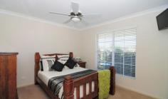 63 Vost Dr Sanctuary Point NSW 2540 $485,000 IT'S ALL DONE - JUST UNPACK Built with retirement in mind, but also suitable for families this home has many features that will allow you to just move in, unpack and relax. With plenty of room for the caravan, boat and a few cars. Three spacious bedrooms, two bathrooms. Private lounge room, open plan living/dining. Well equipped kitchen with breakfast bar. Huge covered all weather patio/bbq area. Extended garage depth, suit large car or boat. Reverse cycle air-conditioning, solar power. Side access, parking bay for van/motorhome. Fully landscaped yards with lush green lawns. Veggie patches and handy garden shed. 683m2 block, backs reserve, tranquil outlook.