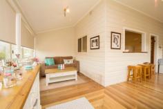50 Durham Rd East Gresford NSW 2311 $313,000 Property ID 45594 Immaculately presented and very well maintained, this super cute weatherboard and iron roofed home is just oozing character and charm, and is conveniently located in the centre of town close to Public School, grocery store, sporting fields and showground. As you enter the home you are immediately welcomed by 9ft high ceilings and lovely polished hardwood timber floorboards. There are 2 bedrooms with built-in robes and each has their own r/c air-con unit. The 3rd bedroom / nursery / study is a beautiful light filled room with access directly out to the open verandah. At the hub of the home, a well appointed kitchen with brand new 900mm stainless steel stove, large corner pantry, and a servery out to the beautifully converted and enclosed sunroom and casual family room. The lounge room also has air-con, and a new slow combustion wood fire. The main bathroom is spacious, and the separate laundry offers a 2nd toilet. Living extends to the outdoors which offers a fabulous new steel framed timber entertaining deck with lovely mountain views. The securely fenced front and rear yards offer plenty of room for the kids and pets to play, and there is certainly room for all the toys with loads of under house storage, a lockable workshop, established driveway offering plenty of off-street parking and ample room for a shed or carport on the approx 736sqm block. You will fall in love with this one! Proudly marketed by Kristy Resevsky of PRDnationwide Hunter Valley. Call today on 0488 677 000 to book an inspection. Land area 0.07HaAir Conditioning