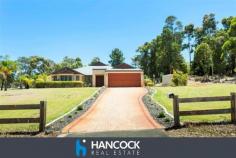 3 Crowd Rd Gelorup WA 6230 $719,000 ULTIMATE LIFESTYLE HAVEN Web property id: 641 Amazing opportunity to secure your ultimate lifestyle dream. Situated on a sprawling 6,700sqm of rural bliss, yet only minutes away from the expanding Dalyellup Shopping Precinct so you get the best of both worlds. A sensational property with monstrous open plan living area, separate theatre room and beautiful added extras such as recessed ceilings, down lights and r/c a/c. The four bedrooms are a great size with either walk in or built in robes and your guests will enjoy spending the weekend, with the spare bedroom having it’s very own ensuite. All year round you can enjoy entertaining outside under the massive fully enclosed patio. Enclosed with floor to ceiling glass panes you can kick back and enjoy the view of the magnificent gardens, all year round. Additional features include a huge 12m x 12m x 3.6m high shed, bore with filter system, rain water tanks and auto retic system.