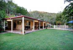 49 Smethurst Rd Mt Julian QLD 4800 $645,000 Property ID: 8956566 It's a special life when you live on acreage but not many properties tick all the boxes for all your needs. With not a neighbour in sight, you will love entertaining by the pool with a large deck area and wood fire pizza oven and listening to the running creek in the wetter months, have plenty of room to tinker around with in the shed plus carports for cars and boats. An endless supply of water with bore and tanks to keep the manageable grass areas looking green all year round and if you enjoy having horses, you will love the 2 holding yards, stable and room for a training arena. It will suit a growing family with 5 bedrooms, air con to each of them, tiled open living areas and fully covered verandahs to 3 sides of this very practical home. Be close enough to the action in Airlie beach or Proserpine yet only minutes drive to get away from it all and enjoy a magnificent life. This home will have you standing still to consider your options to own it.