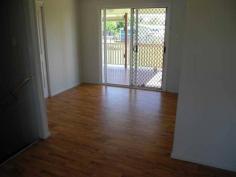 12 Hickman St Bororen QLD 4678 $285,000 HOME IN WHISPER QUIET TOWN Located on a 1,142m2 block this lovely 3 bedroom property is in a fantastic condition. Situated in the whisper quiet country town of Bororen, this is only 20 mins south of Tannum Sands/Boyne Island and 35mins to Gladstone. FEATURES: *Modern kitchen with ample cupboard & bench space *Vinyl timber look floors in living & dining area create easy maintenance throughout *Spacious lounge room now with new air conditioner installed *Master bedroom with air conditioning and built in robe *Remaining 2 bedrooms are fitted with ceiling fans & built in robes *Modern bathroom & huge laundry with striking dark floor tiles *Private spacious timber deck adjoined to the house perfect to enjoy those warm days or the cool evenings *Single lock up garage and fenced yard There is loads of extra land space to build a shed of your dreams or park a van or boat This is a very well looked after home with nothing to do except move in. School bus pick available to Tannum Sands schools or short walk to Bororen Primary school. Walk to local shops and conveniences. Property Amenities & Features General: Reference: 926 Category: House Bedrooms: 3 Bathrooms: 1 Parking: 1 Land Area: 1142 squareMeter Features: Air Conditioning,Garage,Heating,Lifestyle,Value,Electric Hot Water,Air Conditioned,Built In Robes,Close to Schools,Entertaining Area,Established Gardens,Fenced Ba