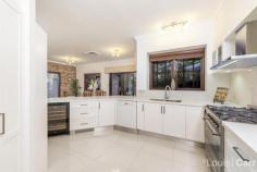 10 Glendale Grove West Pennant Hills NSW 2125 Sandstock Manor - a palatial haven of luxury Welcome to Sandstock Manor, a palatial haven of luxury and custom design that offers the astute entrepreneur an enviable package of absolute comfort, privacy & opulence. Built to meticulous standards, with an elegant gated frontage & manicured gardens, combining urban convenience with estate-like tranquillity. Secure your families investment today, reap the benefits afforded by the 1KM proximity to Cherrybrook Train Station. Set on 1,310m2, on the market by the original owner, it's an outstanding opportunity in a coveted enclave. Immediate access to bus stops for M2 city & local schools, minutes walk to Coonara Village & a plethora of local parks, the epitome of lifestyle convenience! The home offers an unparalleled convergence of luxury and nature. With privacy afforded by opaque vegetation, it provides a sanctuary for contemplation and an exciting space for large scale entertaining with a sequence of outdoor living zones including a sparkling inground pool and cabana as centrepiece. Relax and unwind by poolside level lawns or on the complete wraparound veranda that commands majestic district views or perhaps an outdoor viewing of your favourite film undercover with the in built waterproof flat screen TV. With a double brick ground level, this home encapsulates the art of creating a wonderful balance between form and function. A wealth of sun drenched interiors are designed to take in full views to the outdoor haven. Formal lounge boasts wet bar and open sandstock fireplace; the perfect spot to host cozy indoor gatherings. Other spacious living areas include formal lounge, large rumpus/casual lounge, and versatile sun room/casual lounge with a second fireplace and bay window. The ultra-modern showcase kitchen presents as new and is spectacularly appointed with a diverse range of features including an extensive collection of european stainless steel gas appliances, soft closing drawers, built in wine fridge, dishwasher and waterfall caesarstone benchtops. Accommodation offers the flexibility to suit each family's individual needs housing 5 bedrooms all with built in robes plus a large study/home office or 6th bedroom if required. The master wing encompasses a luxurious en-suite, expansive dressing room, sitting area and balcony access. There are 4 bathrooms in total, 2 fully renovated to the highest specifications with superior contemporary finishes. Special features: *Original Sandstock full brick lower level; upper suspended concrete slab. Keeps the home cool in summer and warm in winter *Ducted reverse cycle air-conditioning *Triple automatic garage with mezzanine storage; granite wet bar, 3m high ceilings *2 sandstock open fireplaces, gas heating points *New carpets throughout, new paintwork *Wrought iron electric gates, galvanised, painted & powder coated, outdoor tv *Intercom system, terracotta roof tiles *5 stage watering system, new gutters