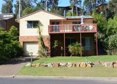 55 Ida Rodd Dr Eden NSW 2551 358000 Position your family in this popular carefree area just a short 300m level walk to magnificent Cocora Beach and playground. This home is much bigger than it looks featuring 4 bedrooms plus a study, all with built-ins and an ensuite to the master. Up top it offers open plan living and dining that opens up to a sunny timber deck out front and a covered rear BBQ deck that is level with the backyard. Downstairs boasts a large 2nd living room with wood heater, 3rd bathroom, big laundry, lots of storage cupboards and internal access to the single lock up garage with remote door. The home has a delightful outlook to a bush and lagoon reserve across the road and the soothing sound of waves from the beach will be clear at night. This is affordable beachside living with great potential for first home buyers or as a family holiday home or investment property with tenants already installed! Go beachside, you deserve it. DeckOutdoor entertainment areaBalconyWood heater300m to BeachReserve outlook3 BathroomsGreat StorageLevel BackyardLevel Walk to BeachGreat areaElectric stoveRange hoodElectric hot water system Bedrooms 4 Bathrooms 3 Garages 1 Land Area 780 m2