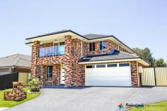 14 Pandorea Street Claremont Meadows NSW 2747 $899,990 OPEN HOME: Saturday 9th January 11:00am - 11:30am House - Property ID: 832257 Very Impressive Located in a new estate and surrounded by quality homes stands this meticulously presented huge family home with outstanding quality inclusions and more than ample room space. Double door entry leads you into a wide hallway with carpet formal lounge are * Open plan dining & family area * Polyurethane kitchen * 20mm granite bench tops * 900mm appliances * Stainless steel range hood, a kitchen built for any master chef * Rumpus room with combustion fireplace for the cosy family get together * Downstairs toilet and vanity * 5 double size bedrooms * Combination of walk in and built in robes * Large ensuite to main bedroom * Frame less shower screens * Double corner spa * Main upstairs bathroom has double vanity & separate toilet * Wide upstairs hallway * Access to balcony with scenic mountain views * Zoned 10hp ducted air conditioning * Sound proof glass to southern facing windows * Manicured gardens * Double garage with one side drive through access * Extensive retainer wall construction * Alfresco dining * Garden shed * Double driveway Call Professionals Outer Western Sydney to find out more today..... Print Brochure Video Email Alerts Features Land Size Approx. - 569 m2