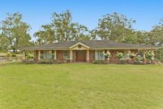 15 Eskdale Park Dr Seaham NSW 2324 $695,000 A WHOLE LOT OF HOME Impressive family home set on 2 1/2 acres in a highly desirable rural estate. Ideal for entertaining or just getting away from the rat race, Only 10 minutes to a major shopping centre and only 30 minutes to Newcastle. Features: * 5 Bedrooms all with built in robes * Ensuite and walk in robe to main * Study * Spacious combined formal lounge and dining area * Large modern kitchen with loads of cupboard and bench space * Tiled family room off the kitchen * Separate rumpus/games room that can be closed off with byfold doors * Huge covered entertaining area approximately 60m2 that over looks the pool